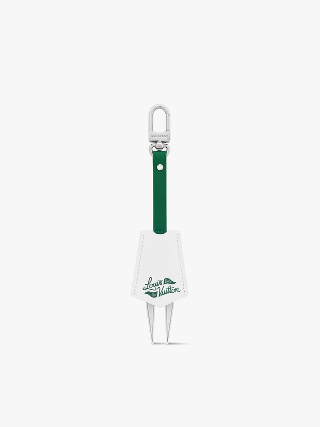 Golf divot repair tool